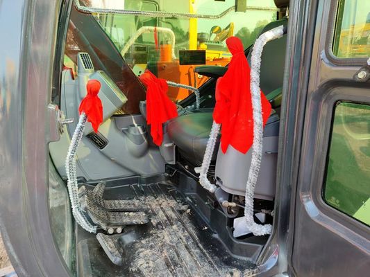 Hitachi ZX60 Excavator Perfect for Slope Trimming in Highway and River Construction